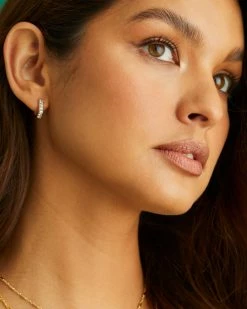 Kendra Scott Davie 18k Gold Vermeil Huggie Earrings In White Topaz 8 Kendra Scott Davie 18k Gold Vermeil Huggie Earrings In White Topaz -Demi-Fine Jewelry Shop Kendra Scott Davie Huggie Earring White Topaz Gold Vermeil 01