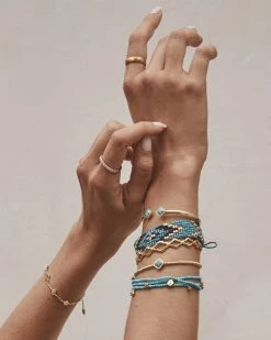 Kendra Scott Britt Vintage Gold Convertible Stretch Necklace In Variegated Turquoise Magnesite 4 Kendra Scott Britt Vintage Gold Convertible Stretch Necklace In Variegated Turquoise Magnesite -Demi-Fine Jewelry Shop kendra scott britt convertible stretch necklace vintage gold variegated turquoise magnesite